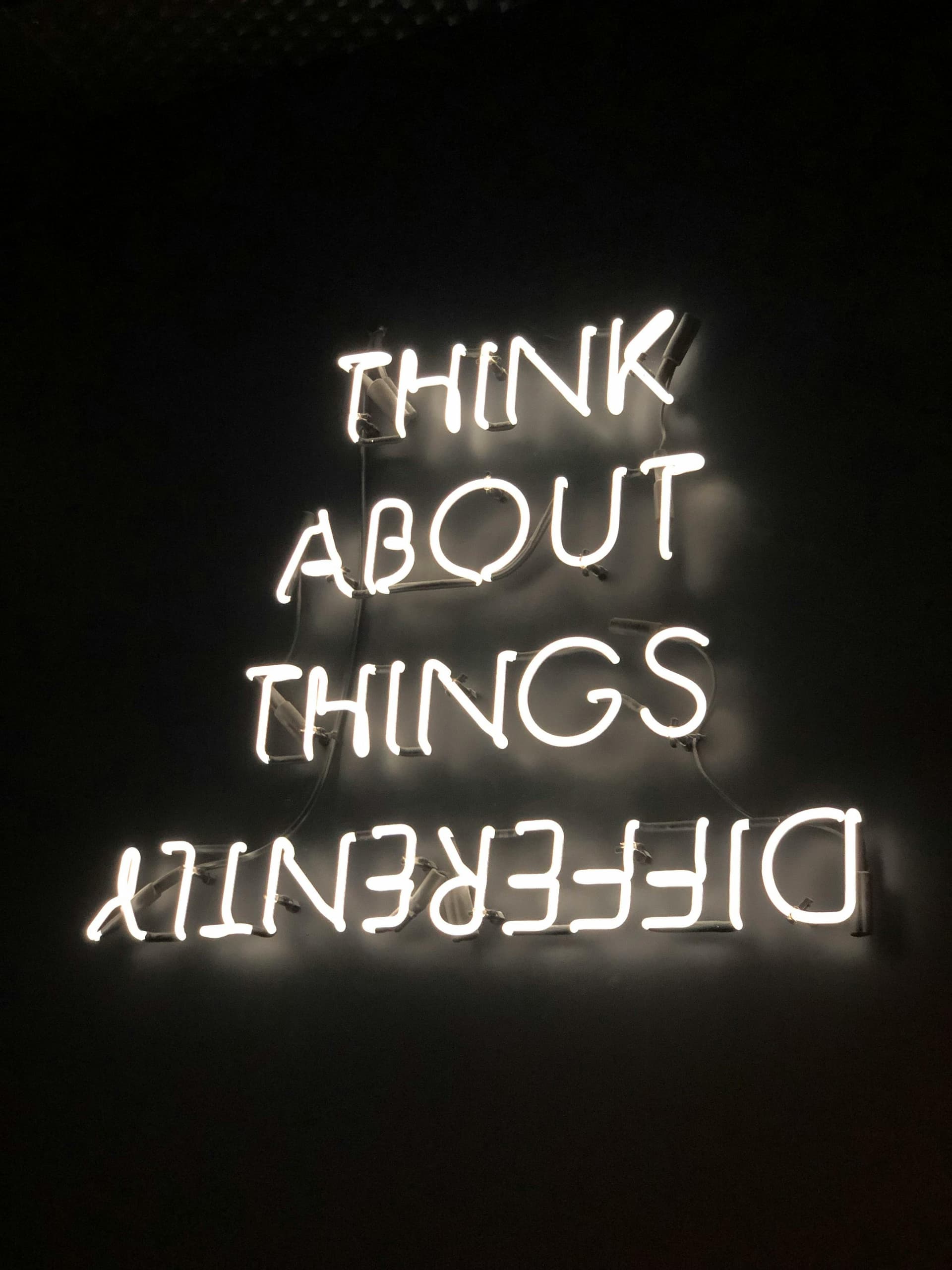 Neon light with think about things differentyly
